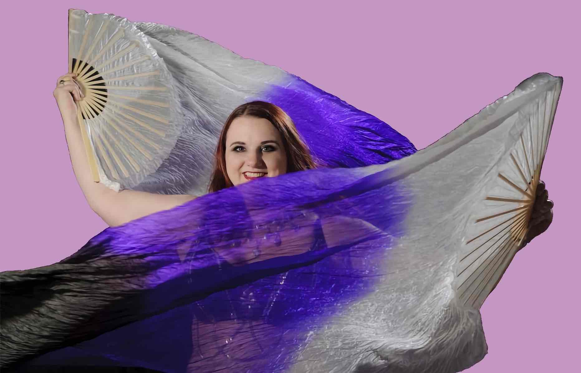 Portrait of Jess posing with fan veils